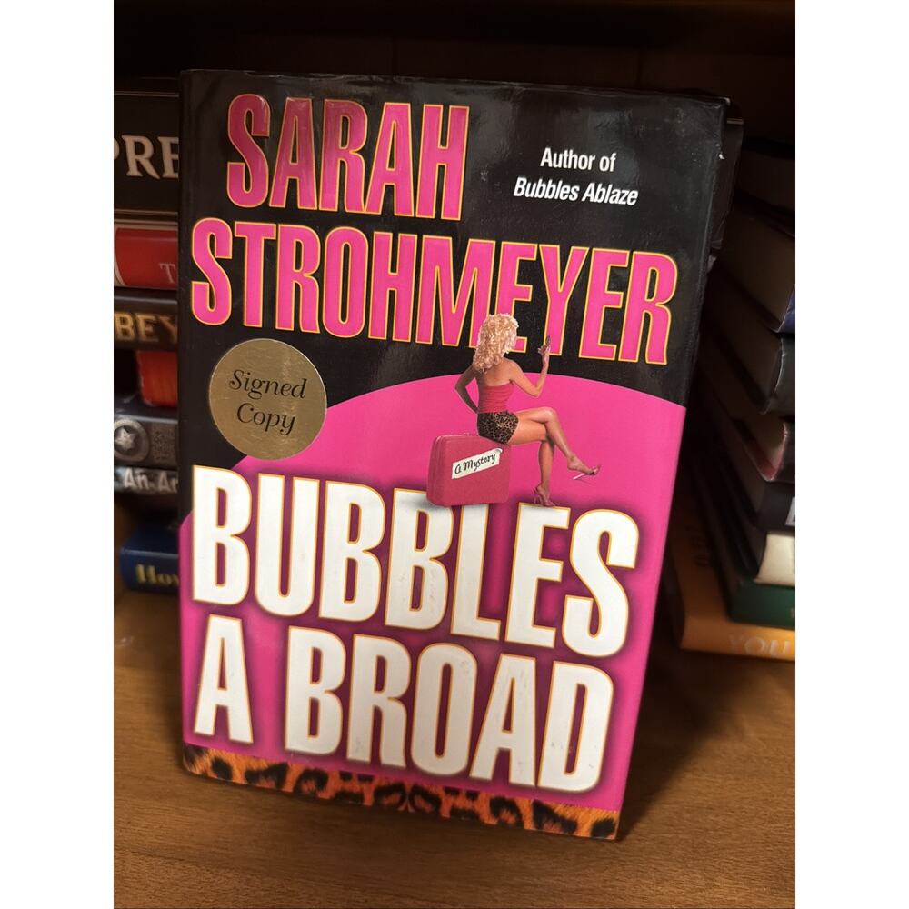 Sarah Strohmeyer.. Signed Cooy "BUBBLES A BROAD" signed book‎